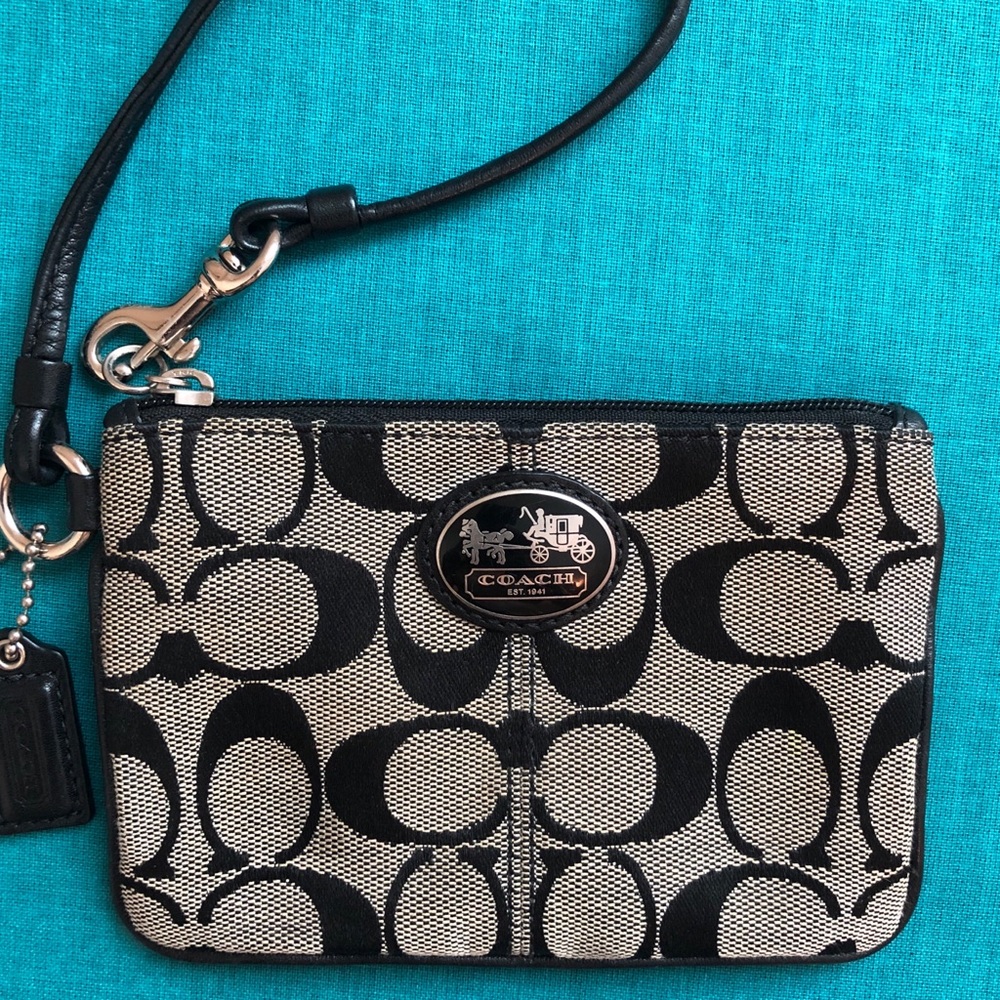 Black and grey coach wristlet
